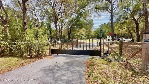 17622 Caufield Rd, Spring Hill, FL, 34610-3002 | Card Image