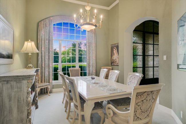 Dining area with arched walkways | Image 4