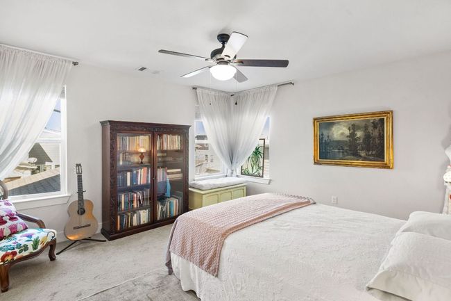 Bedroom featuring visible vents, carpet floors, and a ceiling fan | Image 20