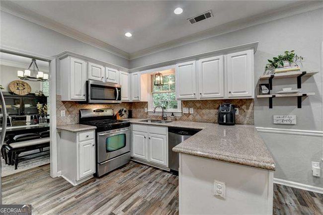 5574 Wynhall Dr, House other with 4 bedrooms, 3 bathrooms and null parking in Peachtree Corners GA | Image 16
