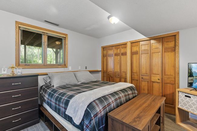 Alower level that offers potential for guest or in-law accommodations, this home combines comfort, function, and style in every corner. | Image 33
