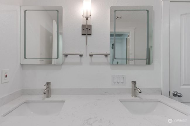 primary bath with led lighting in the mirror | Image 13