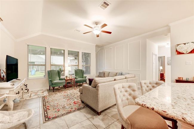 Living room with view of the large backyard space | Image 16
