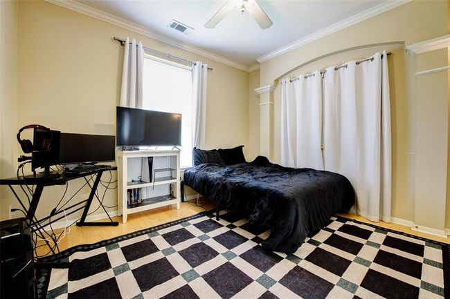 1st floor bedroom offers an option for a study/office space | Image 12