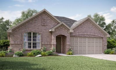 View of front of home featuring a garage and a front lawn | Image 1