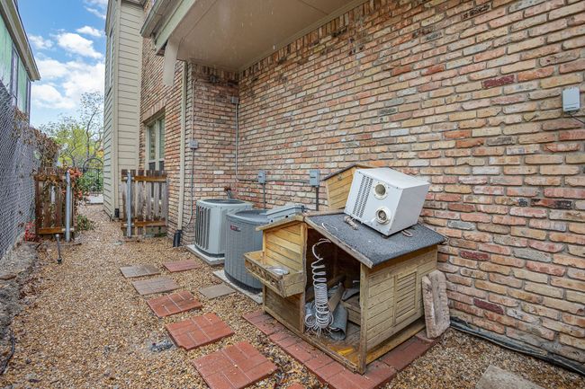 View of patio / terrace featuring central AC and fence | Image 20
