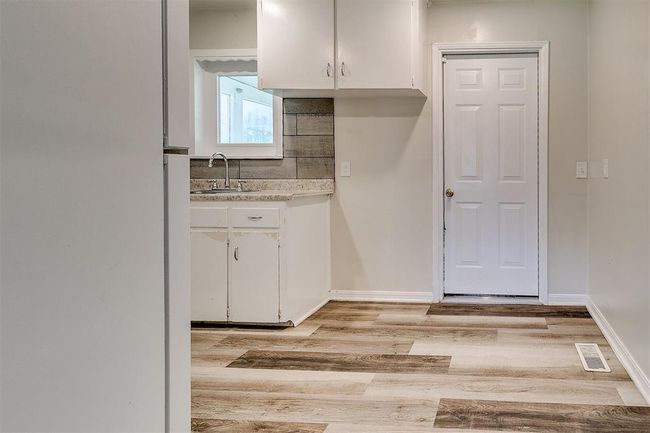 Room for table and chairs on the right side of the kitchen. | Image 17