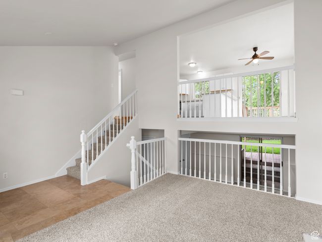 Unfurnished room featuring a ceiling fan and baseboards | Image 7