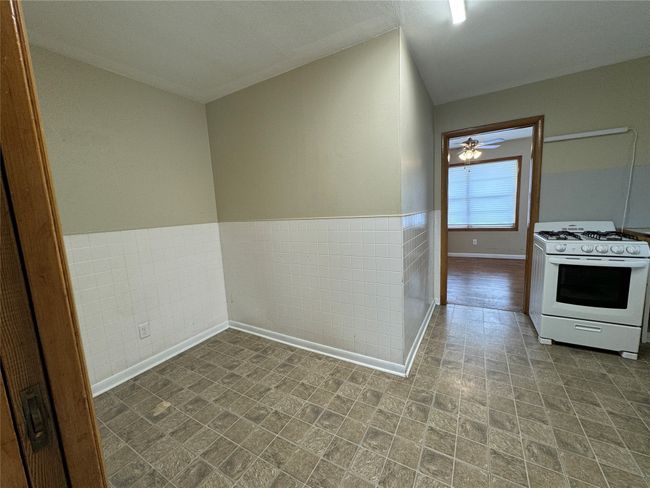 Unit A kitchen with room for small table and chairs | Image 15