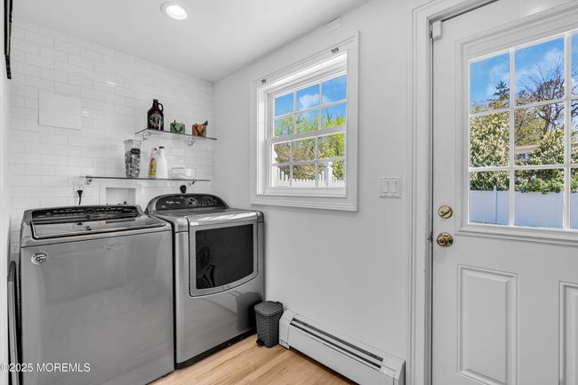 laundry/ mud room with access to yard. | Image 17