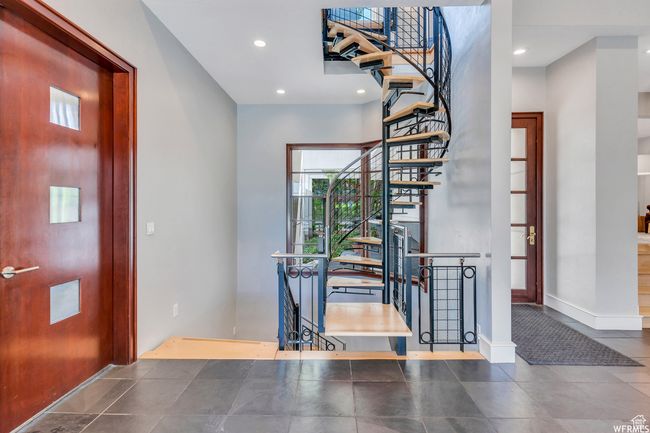 Stairs to the upper level office or studio | Image 16