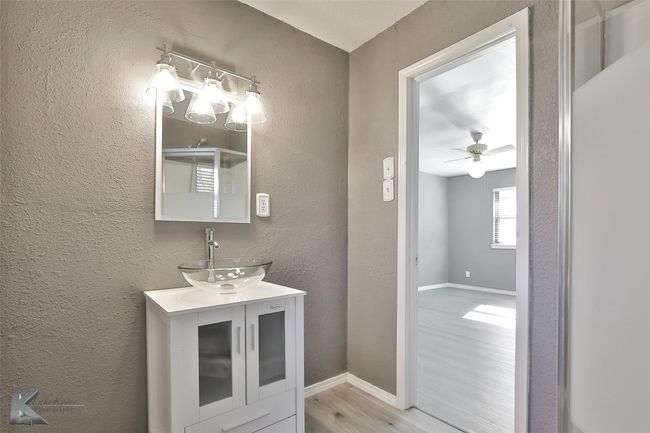 Bathroom featuring hardwood / wood-style floors, vanity, and ceiling fan | Image 14