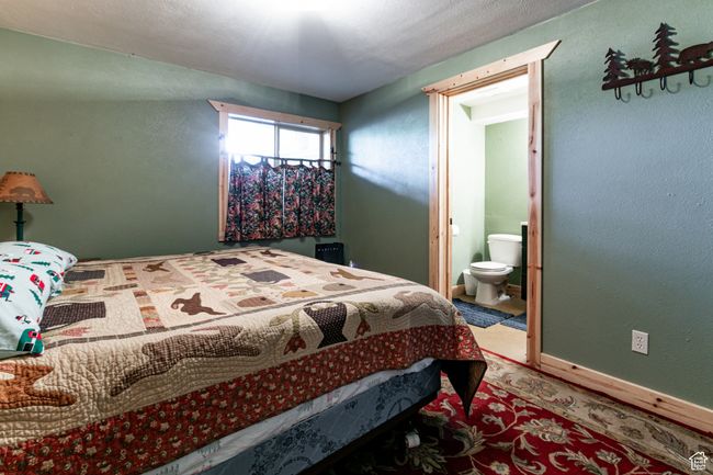 Bedroom featuring ensuite bathroom | Image 22