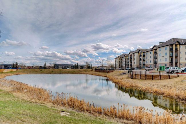 8429 - 304 Mackenzie Way Sw, Home with 2 bedrooms, 2 bathrooms and 2 parking in Airdrie AB | Image 34