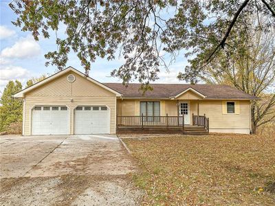 Single story home with a garage | Image 1