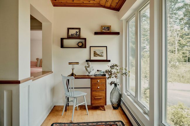 Home office with light wood-type flooring, wooden ceiling, vaulted ceiling, and a baseboard radiator | Image 13