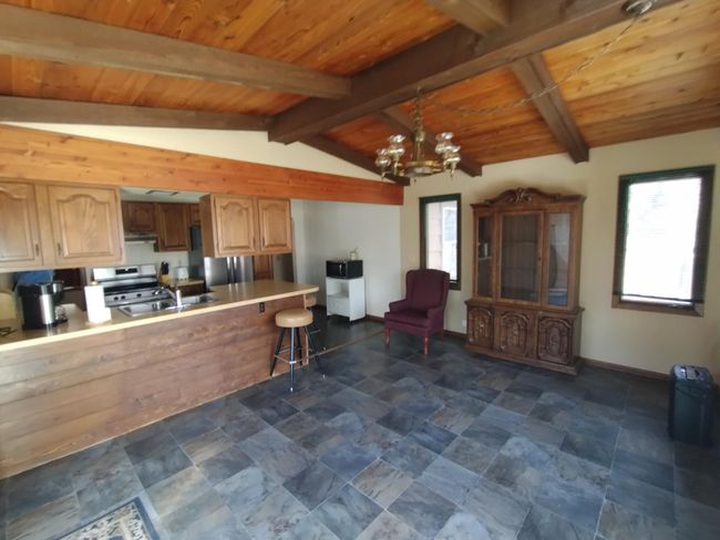 Large Dining area with beautiful tile flooring | Image 8