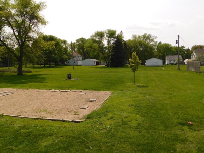 Sand area had a swimming pool on it. | Image 24