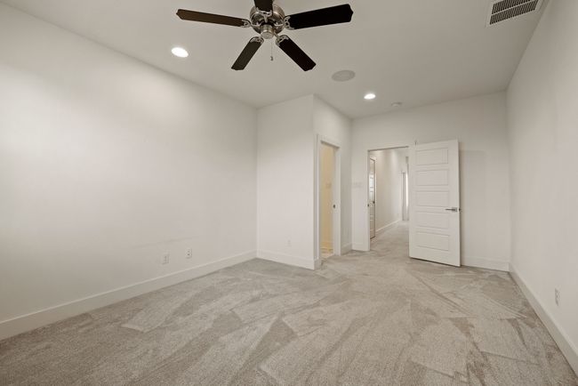 Unfurnished room featuring recessed lighting, visible vents, baseboards, and light carpet | Image 27