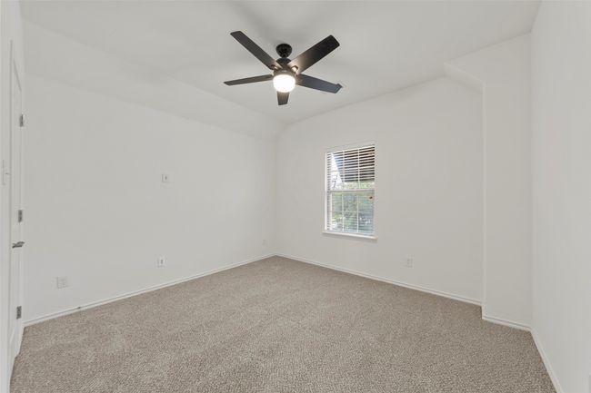 Carpeted Bedroom with baseboards and a ceiling fan. Carpet installed April 2025 | Image 25