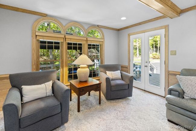 Sitting room with french doors, plenty of natural light, beam ceiling, and recessed lighting | Image 17