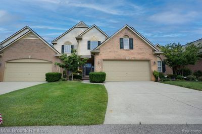 8214 Springdale Drive, Condo with 3 bedrooms, 2 bathrooms and null parking in White Lake Twp MI | Image 1