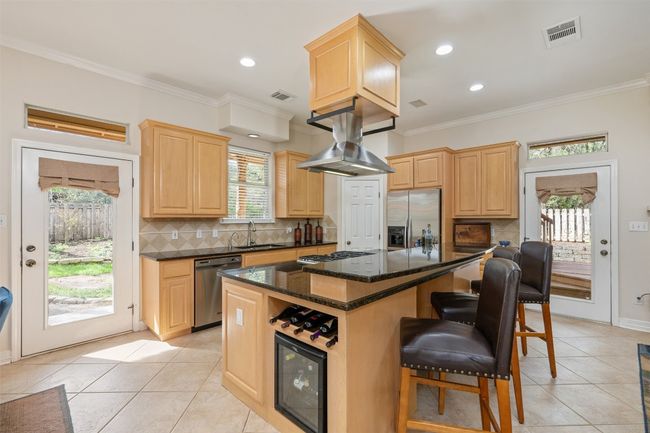There is bar seating for breakfast, or visiting friends and family. | Image 8
