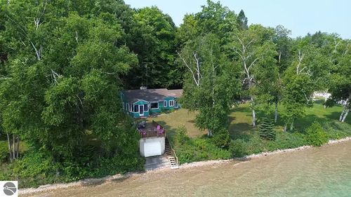 1070 Us Highway 31 N, Kewadin, MI, 49648 | Card Image