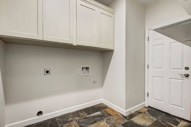 Laundry room with washer/dryer hook-ups and storage | Image 30