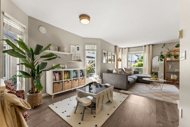 Living area with hardwood / wood-style floors | Image 12