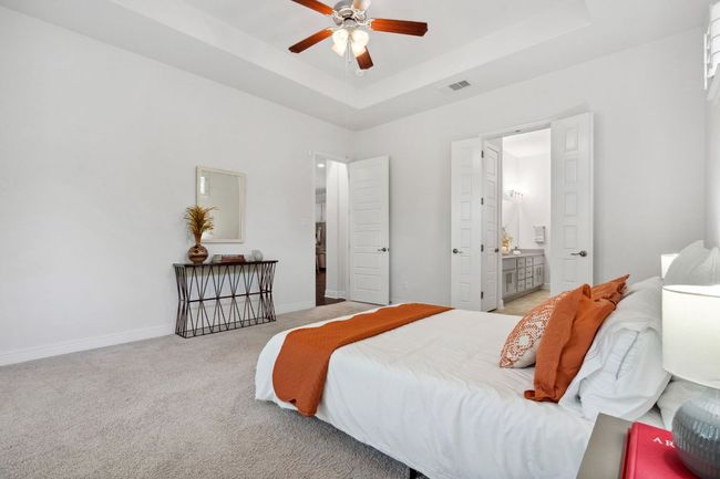 French doors lead to the ensuite spa bathroom. | Image 21