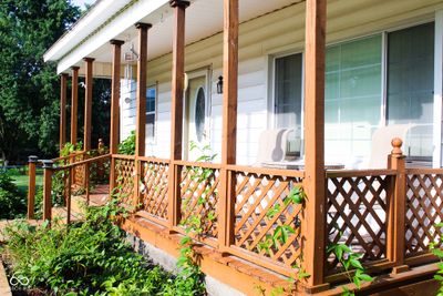 Covered front porch to relax rain or shine! | Image 3