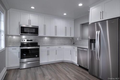 63b-63 Island Blvd, Bohemia, NY, 11716-4928 | Card Image