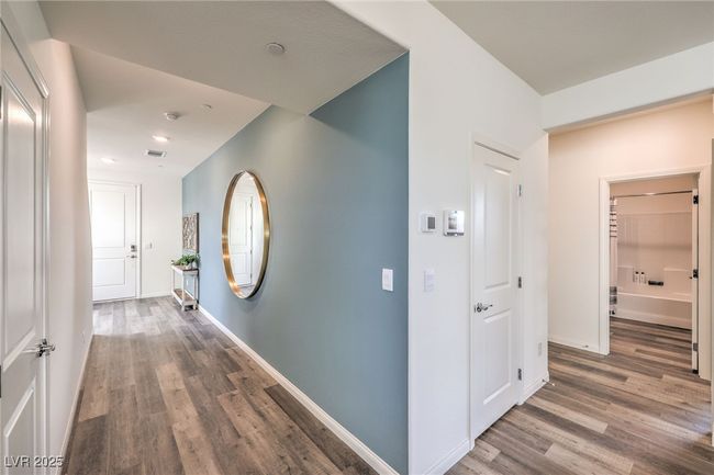 Corridor with wood finished floors, baseboards, and recessed lighting | Image 6
