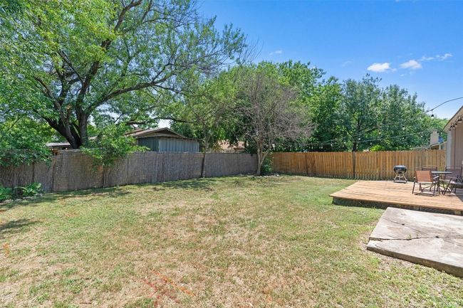 View of yard with a deck | Image 28