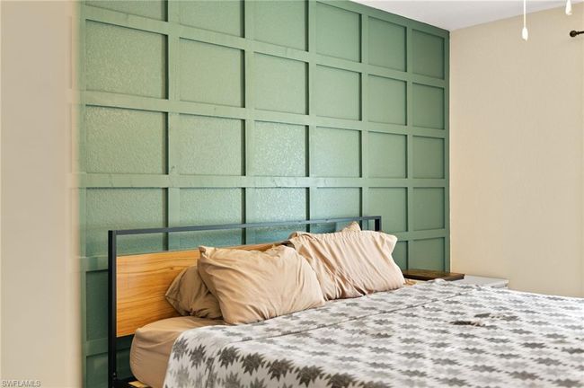 Bedroom with a decorative wall | Image 28