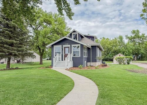1316 W Fairview Ave, Olivia, MN, 56277-1239 | Card Image