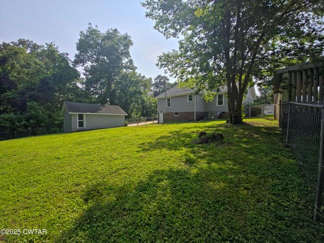 242 N Broad St, House other with 3 bedrooms, 2 bathrooms and 4 parking in Lexington TN | Image 13