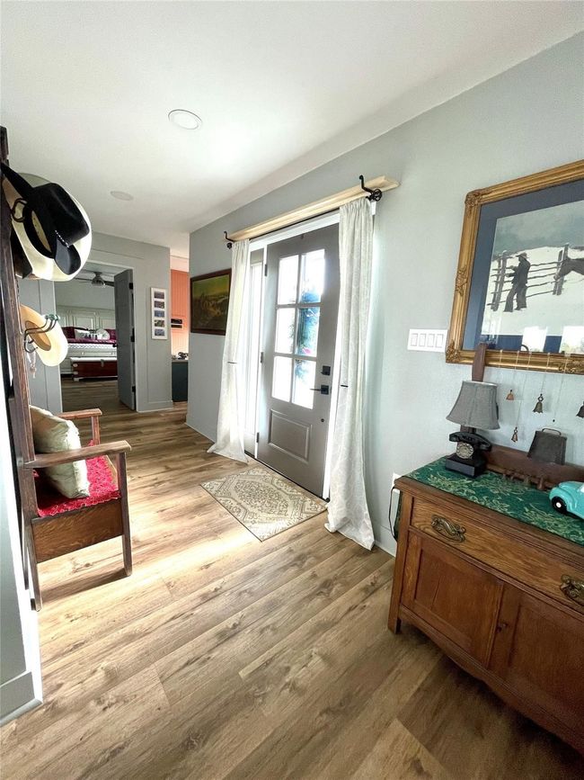 Foyer entrance with light wood finished floors | Image 9