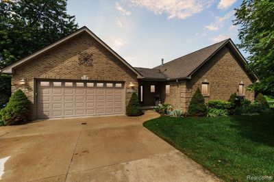 7477 Ore Knob Drive, Home with 3 bedrooms, 3 bathrooms and null parking in Tyrone Twp MI | Image 1