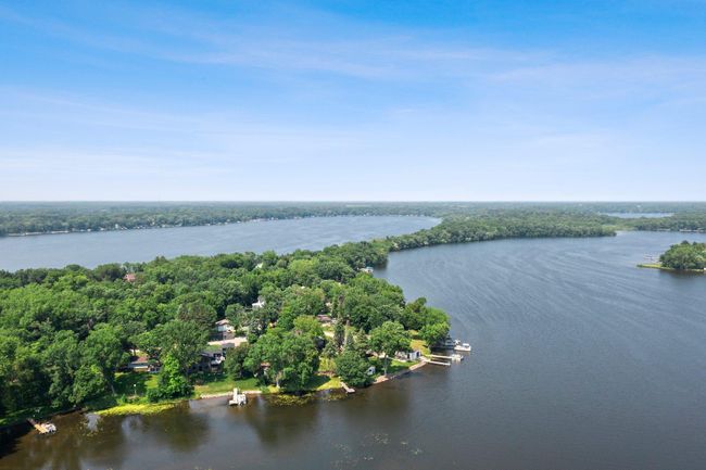 This lakeside property offers the perfect blend of natural beauty, comfort, and flexibility—with spaces ideal for entertaining, relaxing, or generating rental income. | Image 25