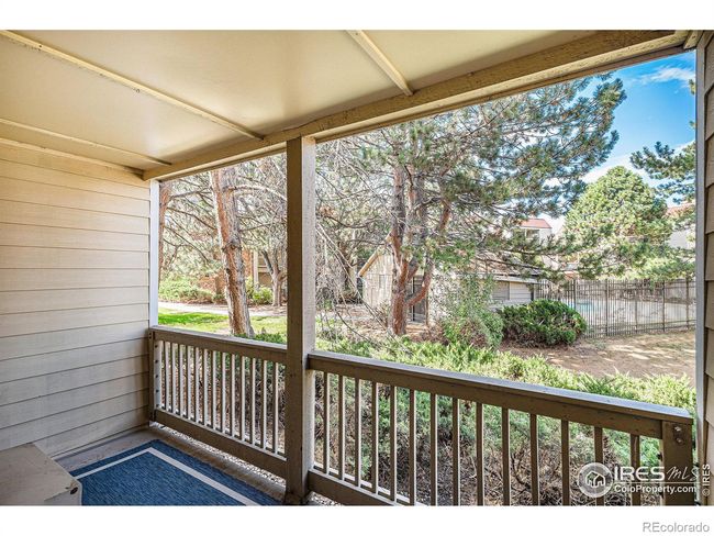 Treed view and Community Pool right outside. | Image 10