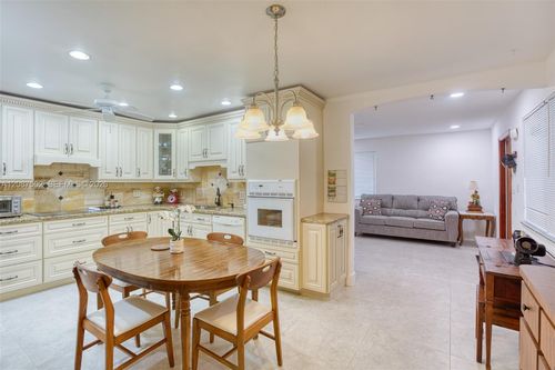 1-221 Ne 1st Ter, Dania Beach, FL, 33004-4802 | Card Image