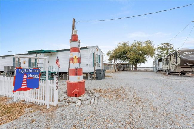 white mobile home closest to the road is no longer on this property. | Image 30