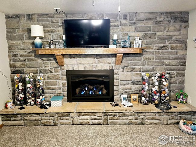 Gas fireplace provides warmth during an electrical outage. | Image 18