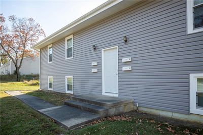 Entrance to property with a lawn | Image 2