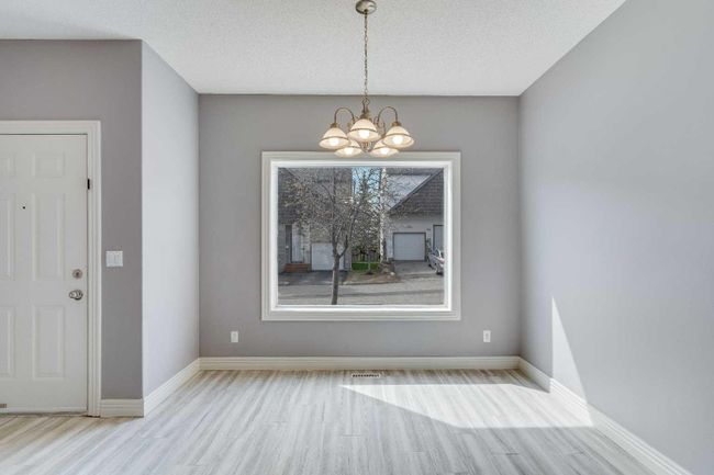 135 Bridlewood View Sw, Home with 4 bedrooms, 2 bathrooms and 3 parking in Calgary AB | Image 2