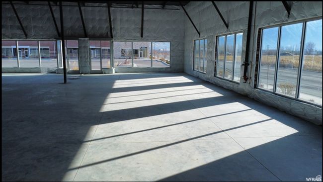 Unfurnished sunroom with a healthy amount of sunlight | Image 10