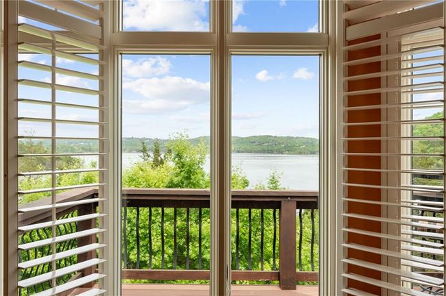 Doorway featuring a water view | Image 23
