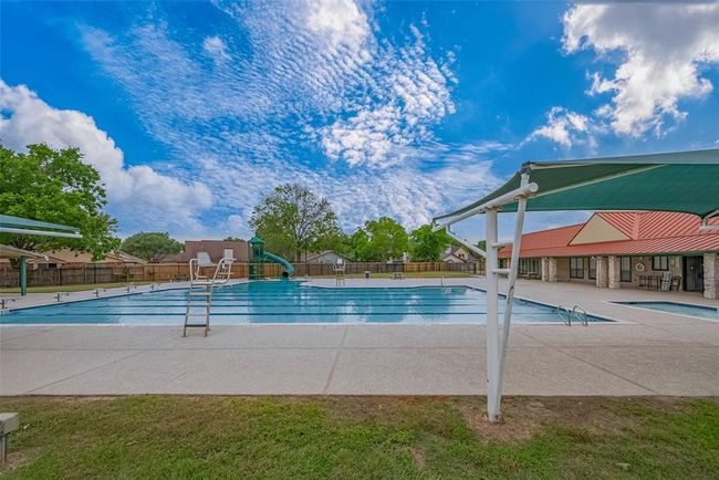 The neighborhood pool with slide and rec center | Image 22